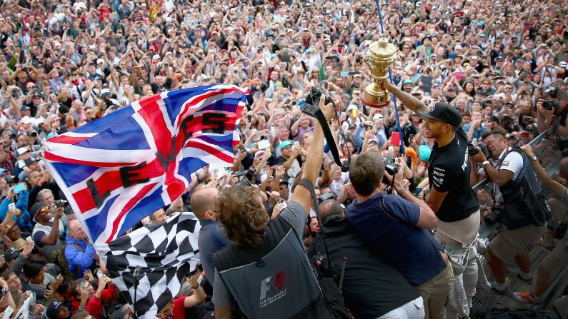 There's no doubt Hamilton has mass appeal. The 30-year-old Briton celebrates victory at the 2015 British Grand Prix with a sea of fans.
