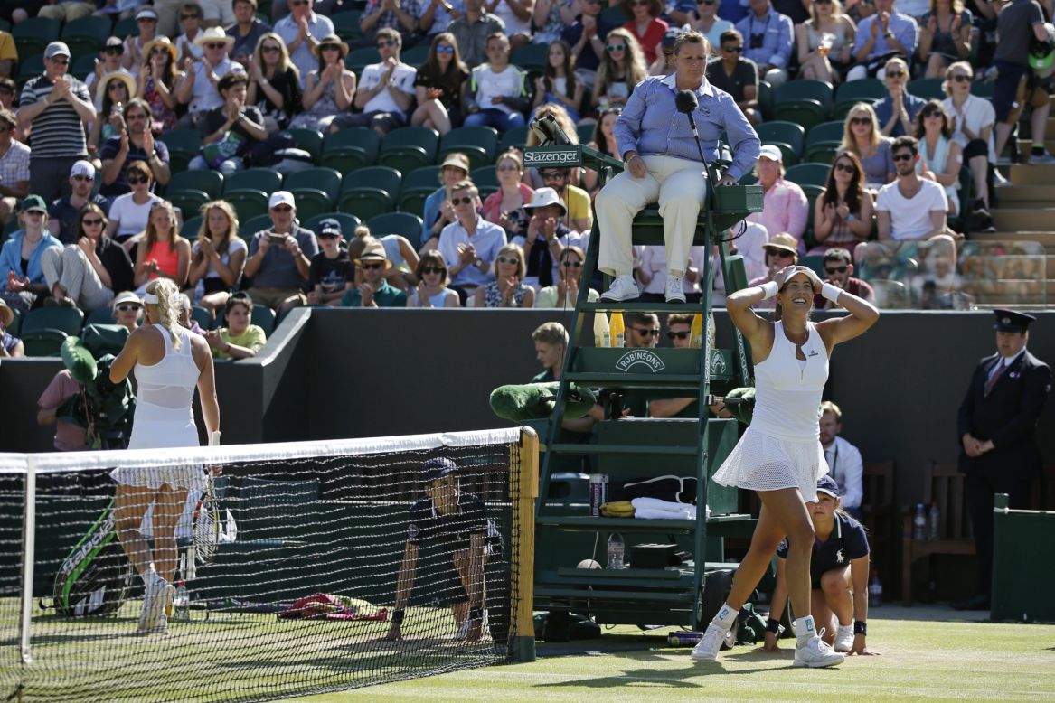 Caroline Wozniacki, left, is out, though. Garbine Muguruza, who has a history of pulling off upsets at majors despite her young age, advanced in two sets. 