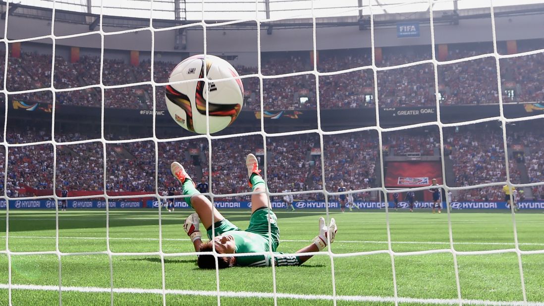 Japan goalkeeper Ayumi Kaihori fails to stop a long-range shot from Carli Lloyd during the Women's World Cup final on Sunday, July 5. Lloyd's shot came from the midfield line and gave the United States a 4-0 first-half lead.