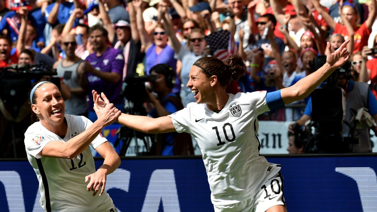 Lloyd, right, celebrates with teammate Lauren Holiday after scoring her second goal of the World Cup final.