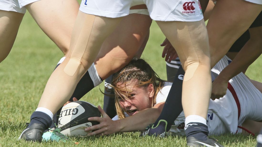 An England player battles for the ball while playing New Zealand in the Women's Rugby Super Series on Wednesday, July 1. New Zealand won the match 26-7 in Red Deer, Alberta.