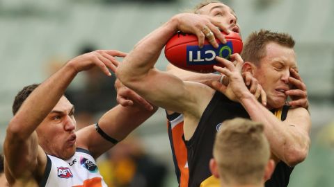 Jack Riewoldt of the Richmond Tigers is poked in the face Saturday, July 4, during an Australian Football League match against the Greater Western Sydney Giants.