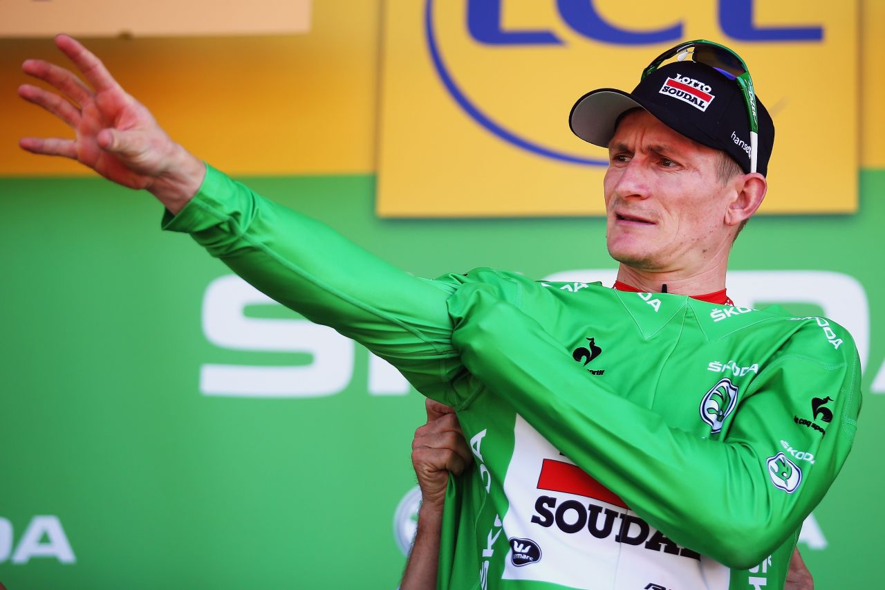 ... while Germany's Andre Greipel (Lotto-Soudal) took possession of the green (sprinter's) jersey. 