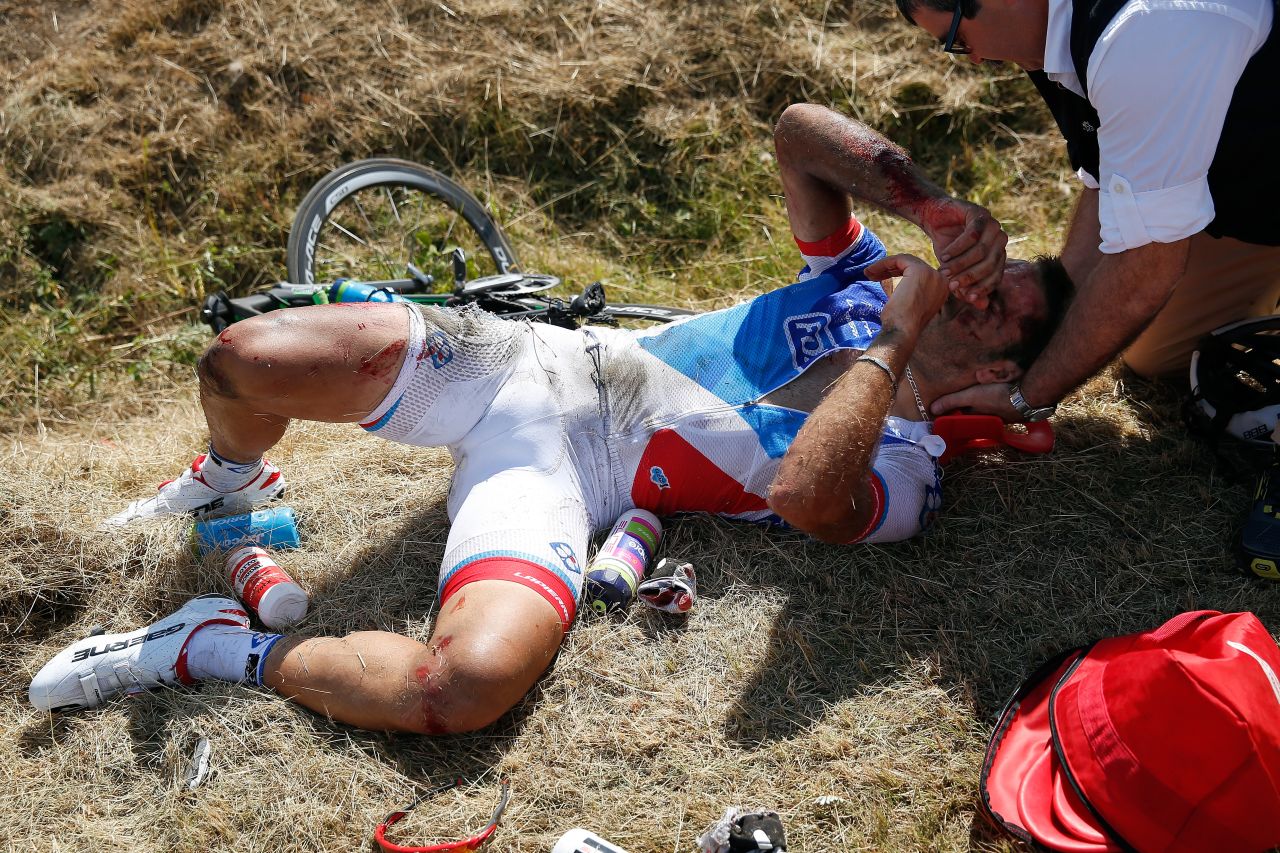 French rider William Bonnet lies battered, bloodied and bruised at the roadside following the crash. A subsequent trip to hospital revealed that he also had a fractured vertebrae. 