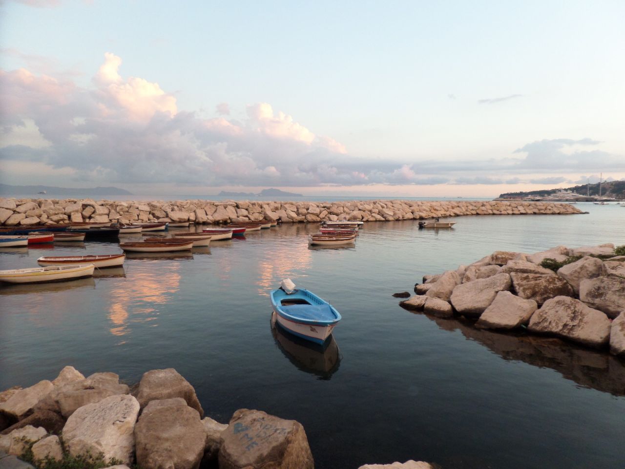 Empty sailboats drift serenely in Italy. "I love how the little blue sailboat has a different look than the others and is floating off on its own, doing its own thing," said <a href="http://ireport.cnn.com/docs/DOC-1219273">Shabrea McElroy.</a>