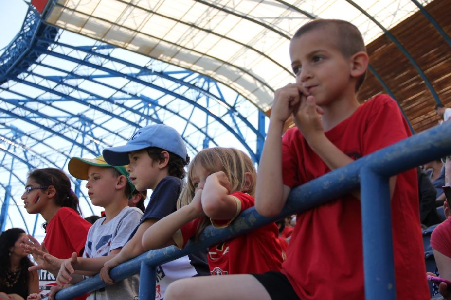 The club gives away free tickets to local children for its home games at Jerusalem's Teddy Stadium. Hapoel shares the stadium with city neighbor Beitar.