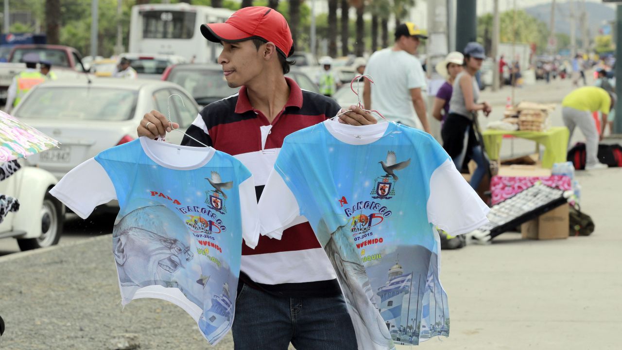Pope T-shirts are sold in the streets of Guayaquil on July 5.