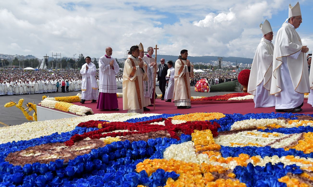 Pope Francis takes the stage for the Mass at Quito's Bicentennial Park on July 7.