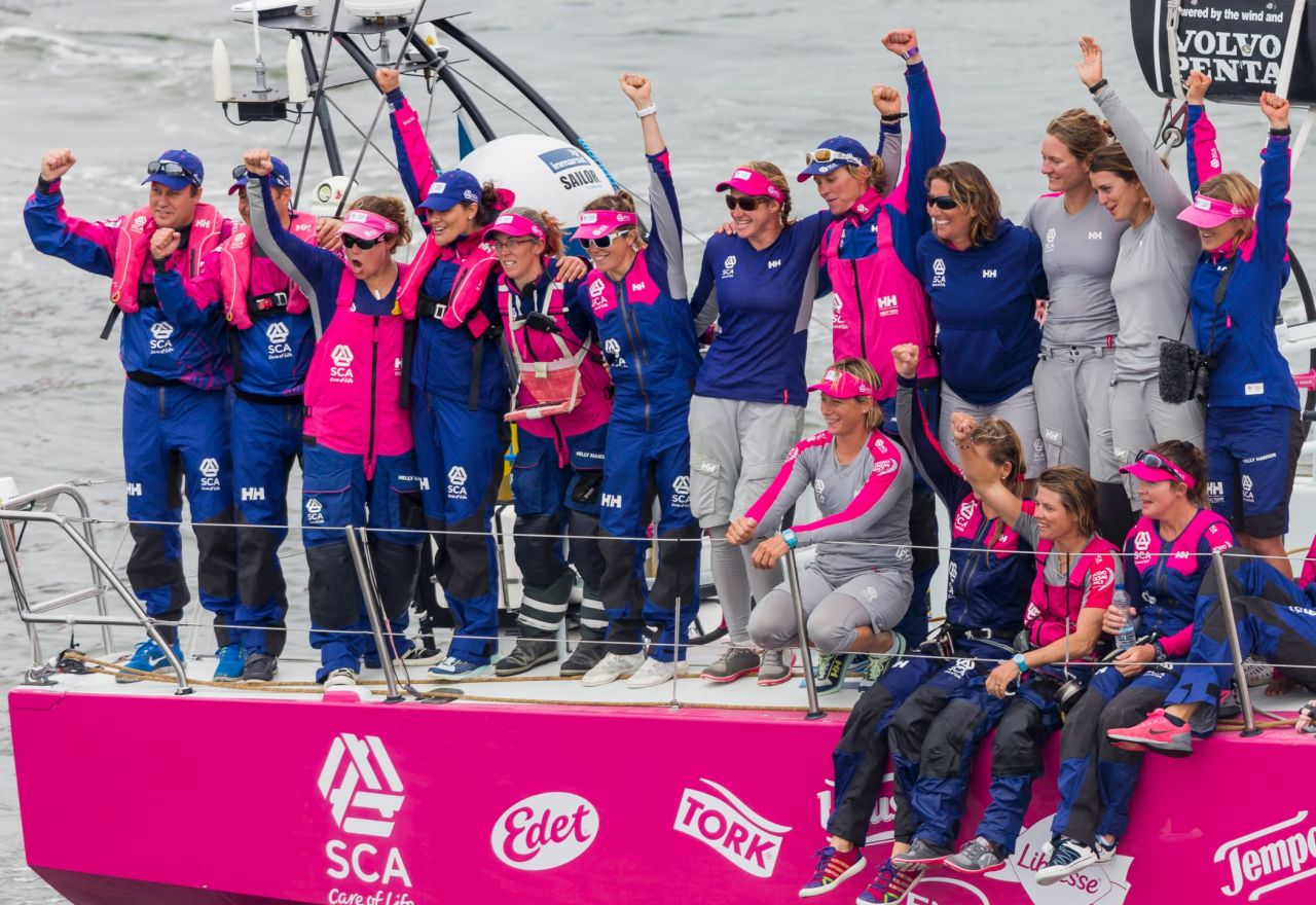 The Team SCA sailors celebrate their arrival into Lorient.