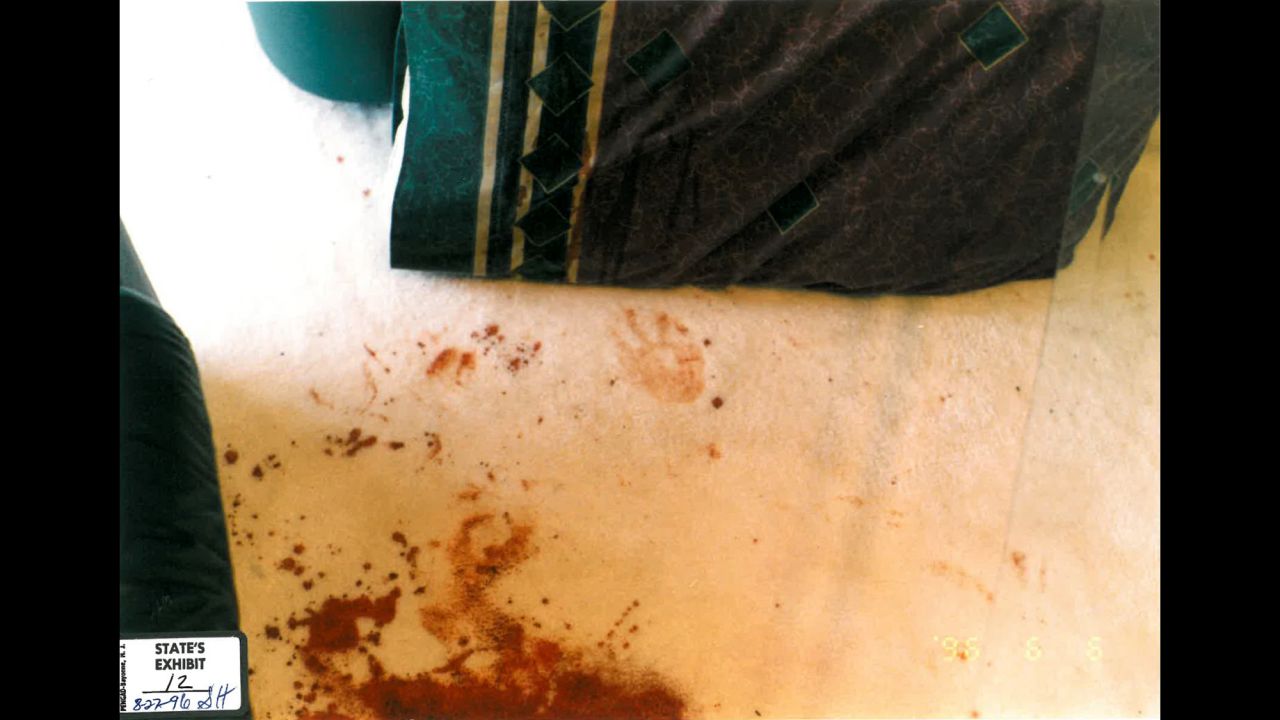 An evidence photo shows 5-year-old Damon's bloody handprint. He had been stabbed multiple times in the back. <br /><br />During the initial questioning, when she'd regained consciousness after surgery in the hospital for her injuries, Routier told police she woke up to a man standing over her and there was a physical struggle. Later, when she was brought into the police department for questioning, she said she awoke to Damon, dripping with blood, calling out, "Mommy! Mommy!"