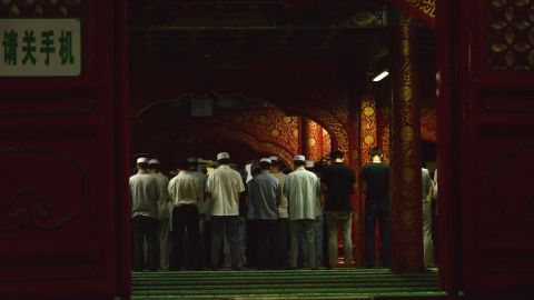 Men pray at the Niujie Mosque on July 6.