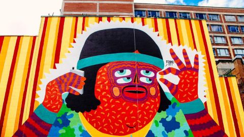 The city of Montreal commissions artists to create street murals on various buildings. 