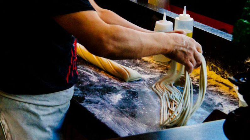 Montreal's Chinatown is home to a thriving immigrant community and international cuisine, including Vietnamese pho and Cantonese BBQ. 