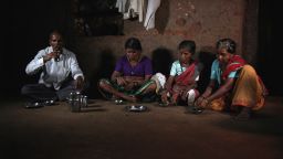 Sakharam Bhagat and his three wives, from left, Tuki, Sakhri and Bhaagi, eat lunch in their house. Polygamy is illegal and a crime in India, but Bhagat had no other option but to marry two more times in order to have more helping hands to get water.
