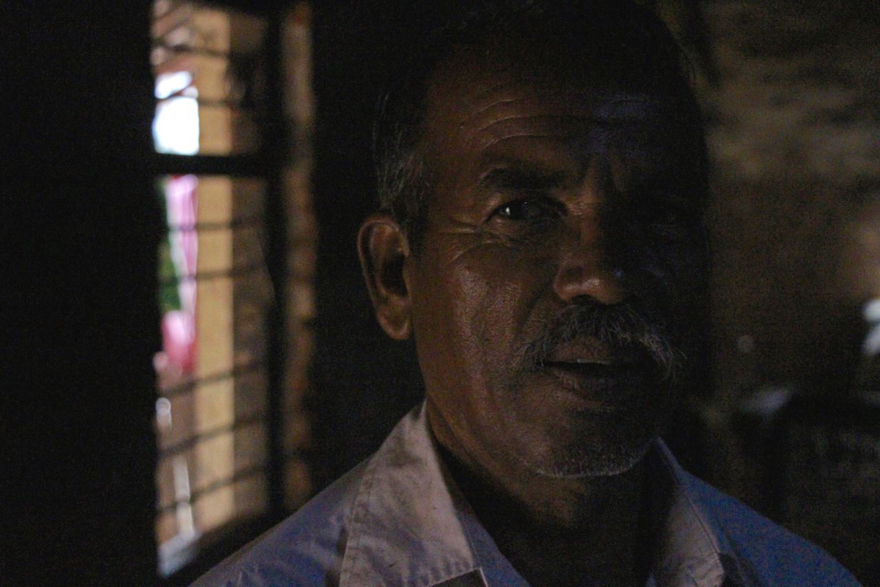 Life is not easy, there is no running water and the electricity shortage is a big problem, Bhagat says, as he stands in his darkened house.