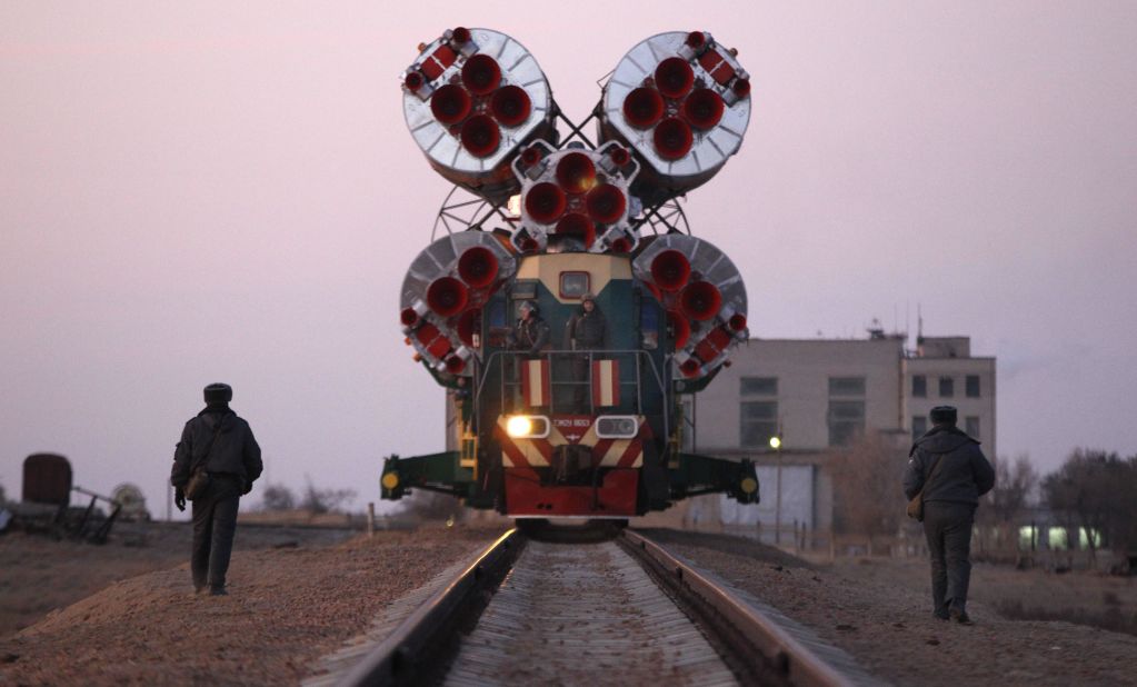 The Soyuz rocket is transported by rail to the launch pad.