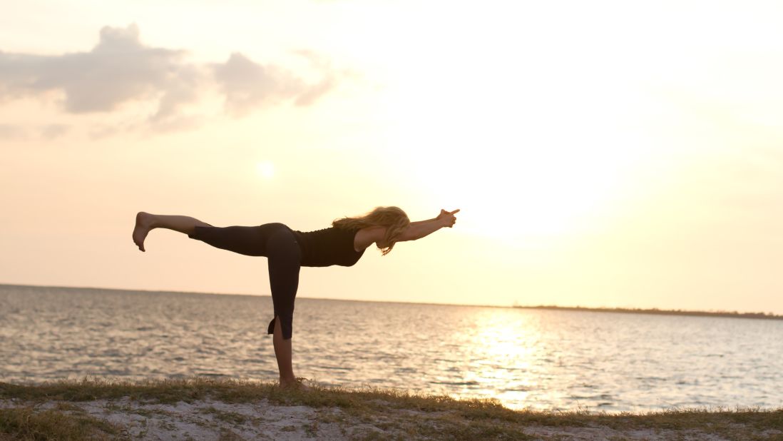 9 Reasons why yoga on the beach is so good for you