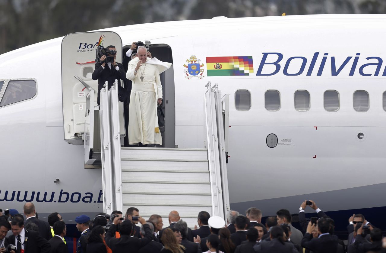 Pope Francis waves goodbye as he prepares to depart Quito, Ecuador, on July 8. 