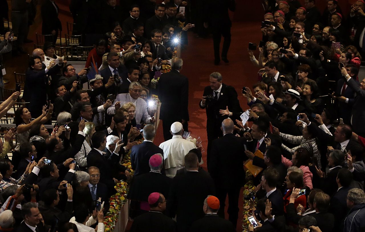 The Pope is cheered upon his arrival at the St. Francis Church in Quito on Tuesday, July 7.