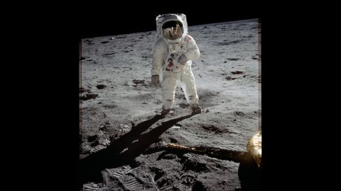Aldrin is photographed on the moon after Armstrong went first and called it "one small step for man, one giant leap for mankind." Armstrong and Aldrin explored the Sea of Tranquility region of the moon. Meanwhile, Collins remained inside the command module for the duration of the mission.