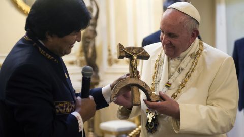 Bolivian President Evo Morales presents Pope Francis with a gift of a crucifix carved into a wooden hammer and sickle, the Communist symbol uniting labor and peasants in La Paz, Bolivia, on July 8. 