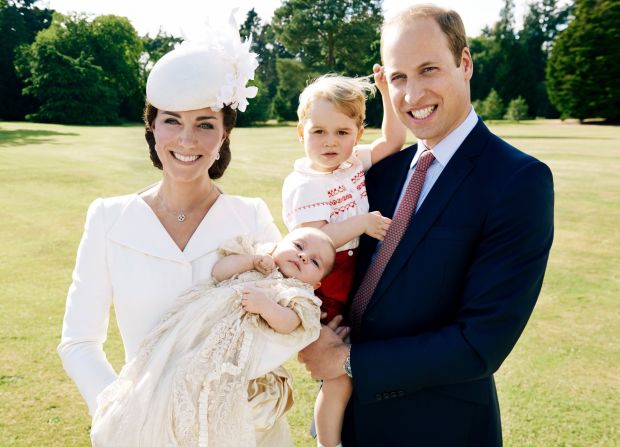 Catherine, Duchess of Cambridge, Prince William, Duke of Cambridge and their children Princess Charlotte of Cambridge and Prince George of Cambridge pose for a photo after the christening of Princess Charlotte at the Sandringham Estate on July 5, 2015 in King's Lynn, England.