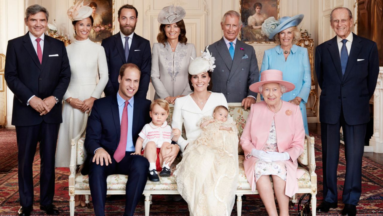 Prince William, Duke of Cambridge, Prince George of Cambridge, Catherine, Duchess of Cambridge, Princess Charlotte of Cambridge and and Queen Elizabeth II pose in front of (L-R) Michael Middleton, Pippa Middleton, James Middleton, Carole Middleton, Prince Charles, Prince of Wales, Camilla, Duchess of Cornwall and the Duke of Edinburgh for a family photo after the christening of the royal family's newest arrival.