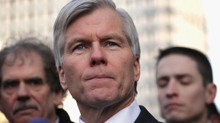 Former Virginia Governor Robert McDonnell (C) pauses as he speaks to members of the media outside U.S. District Court for the Eastern District of Virginia after his sentencing was announced by a federal judge January 6, 2015, in Richmond, Virginia.