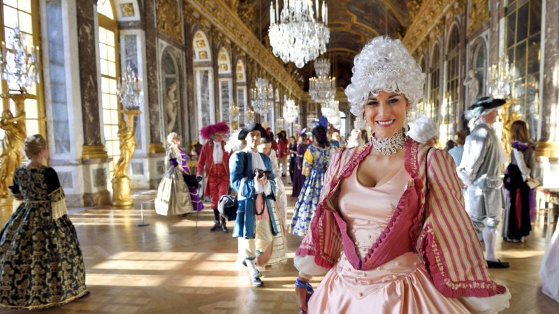 Period costume ball brings France's Sun King back to life in Versailles