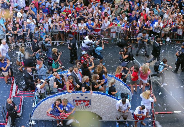 New York Gov. Andrew Cuomo, center, participates in the parade. The U.S. women's team defeated Japan 5-2 to take its third World Cup title.