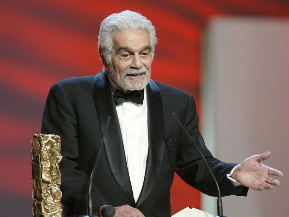 Sharif accepts his Cesar Award at the 2004 ceremony.