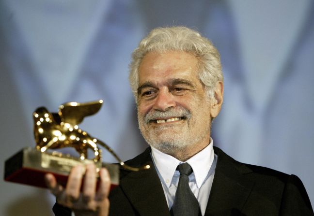 Sharif shows the Golden Lion he received for his career achievement during a ceremony at the Venice Lido in 2003. 