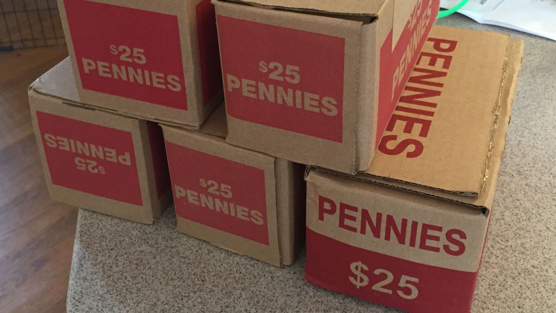 Coyle spent $125 on five boxes of pennies.