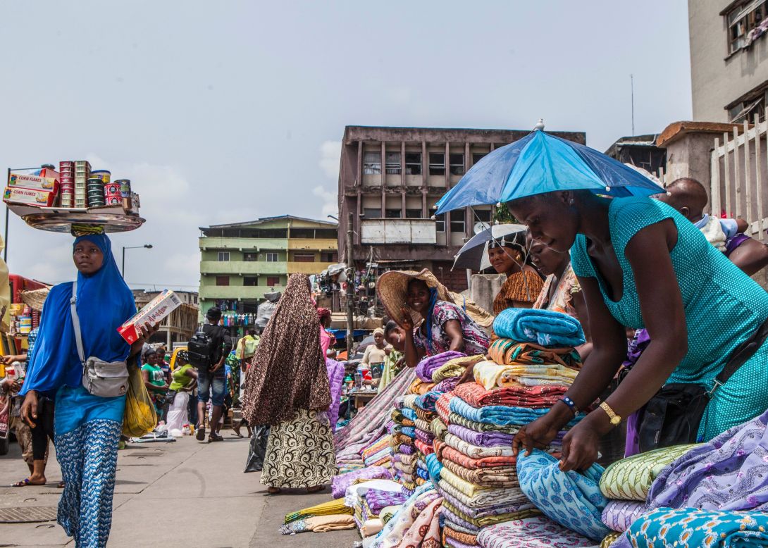 "For me, the Balogun Textile Market is an expression of Lagos, the expression of a megacity," says Esiebo. The colorful fabrics, he note, can often be found on international fashion runways. Moreover, he finds the soul of the city can be expressed in the fabrics.<br /><br />"I'm always drawn to the market, always drawn to the fabrics. For me, it's a reflection of the diversity and colorfulness of the city of Lagos."