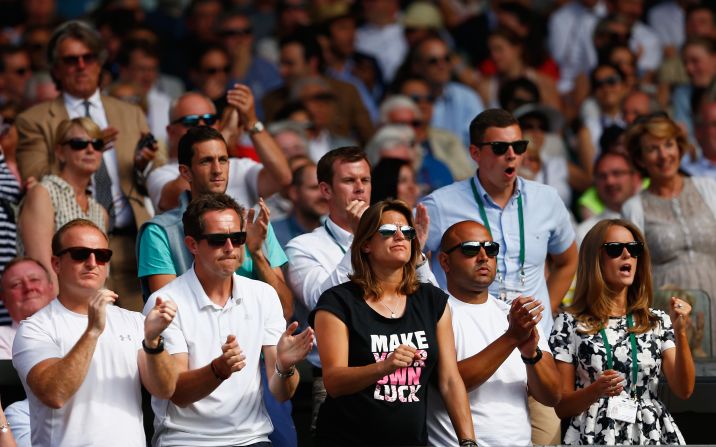 Murray was watched by his coaching team, including Amelie Mauresmo (center) and Jonas Bjorkman (2nd left). His wife Kim is far right.