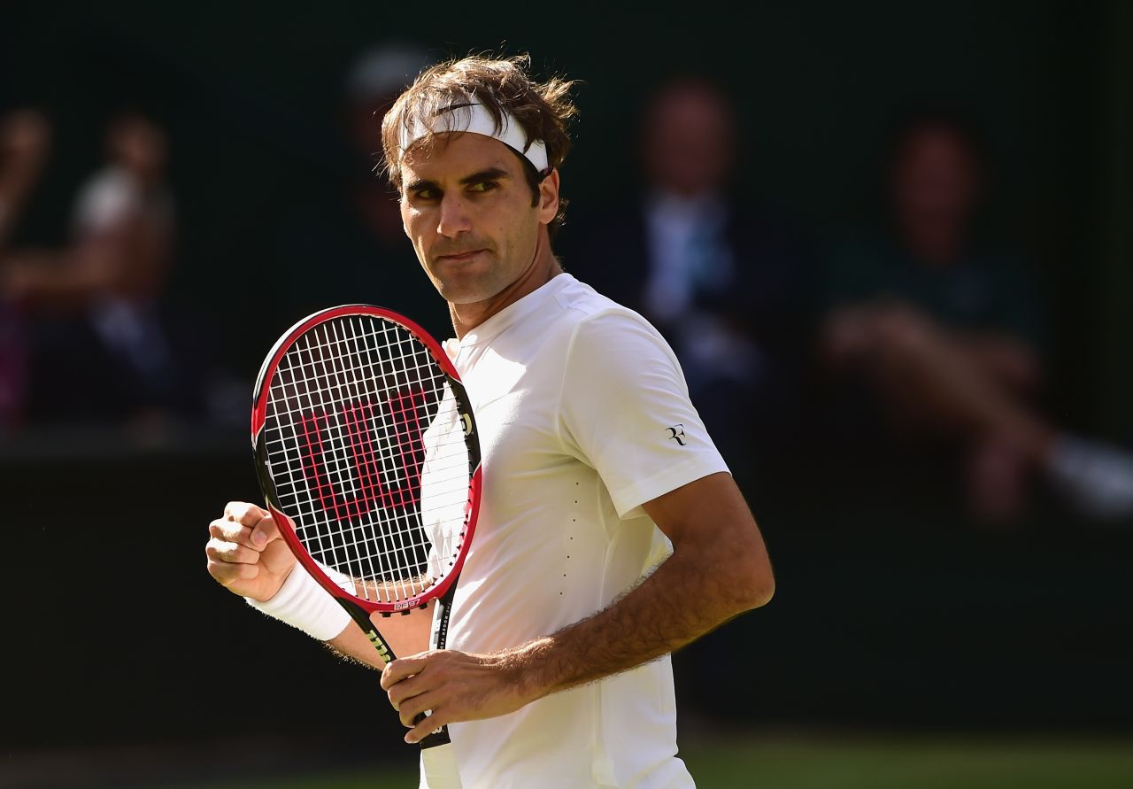 Roger Federer had his game face on as he dismantled Andy Murray's hopes of playing in another Wimbledon final. 