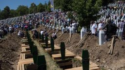 Fresh graves await the burial of newly discovered and identified remains. Often times it is just one or two bones, because so many bodies were mixed together and destroyed in mass graves. One hundred and thirty six new sets of remains were buried on this 20th anniversary.