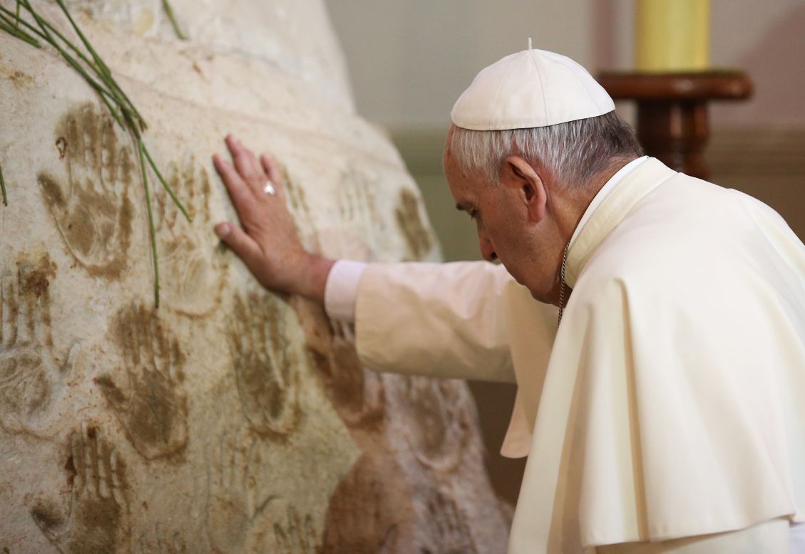 Pope Francis prays at the Shrine of the Virgin of Caacupe on July 11. 
