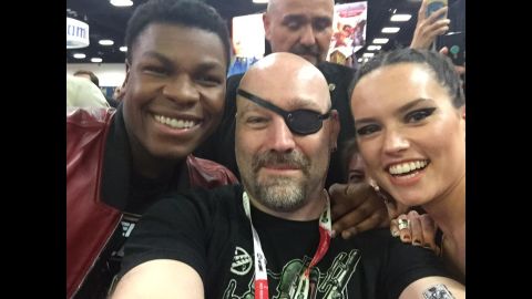 It's rare for celebrities to brave the crowds on the convention floor, but John Boyega (left) and Daisy Ridley did just that. The stars of "Star Wars: The Force Awakens" got this selfie with hardcore fan Eliot Sirota.