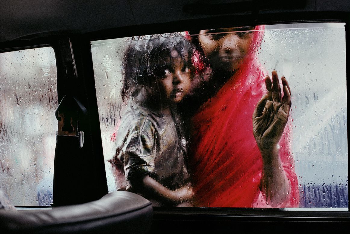 McCurry insists traveling to "exotic" locations -- such as his beloved India, where he captured this mother and child through a taxi window on the Mumbai streets -- is no guarantee of taking an intriguing photo, and that he's just as happy capturing scenes on home turf on the U.S.' East Coast. <br /> <br />"I think that watching human behavior is pretty much the same regardless of where we live." 
