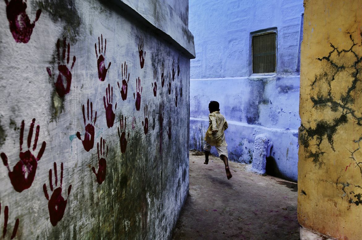 Many of McCurry's works off the coffee trail are widely celebrated examples of composition and form, including this photo taken in 2007 among houses of the Blue City in Jodhpur, India. But McCurry explains these are often the result of a snap reaction to his surroundings.<br /><br />"Generally it's probably rather brief: you go into a home or a shop or some kind of a market or something and you see things and quickly respond."