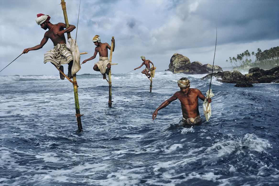 Not all images come easy. This 1995 photo of Stilt Fishermen in Sri Lanka <a href="http://uk.phaidon.com/agenda/photography/articles/2012/december/14/steve-mccurrys-iconic-photographs-3/" target="_blank" target="_blank">required hours spent waist deep in water</a> waiting for the light and subjects to provide the perfect shot.<br /> <br />"I hope as the years have gone by I have become a better storyteller and have a better sense of light and composition and be able to work quickly and economically."