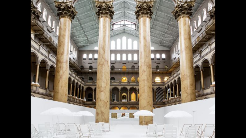 The 10,000-square-foot, stark-white installation includes lounge chairs and a concession stand.