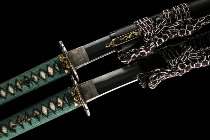 Pictured, short and long swords with matching koshirae (fittings) produced by 17th century master swordsmith Echigo no Kami Kanesada.