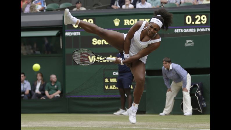 Serena Williams returns a ball to Victoria Azarenka during their Wimbledon quarterfinal on Tuesday, July 7. Williams <a href="index.php?page=&url=http%3A%2F%2Fwww.cnn.com%2F2015%2F07%2F11%2Ftennis%2Fserena-williams-muguruza-wimbledon-tennis%2F">went on to win the tournament</a> -- her fourth Grand Slam title in a row and the 21st of her illustrious career.