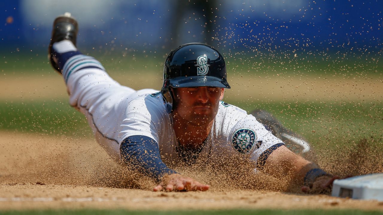 Seattle's Brad Miller steals third base during a home game against Detroit on Wednesday, July 8.