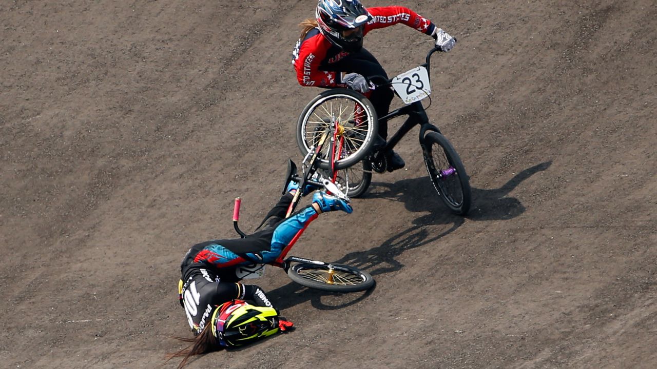 Felicia Stancil of the United States goes around Colombia's Mariana Pajon Londono on her way to winning the women's BMX final at the Pan American Games on Saturday, July 11. Londono, the 2012 Olympic champion, fell on a turn but finished the race.
