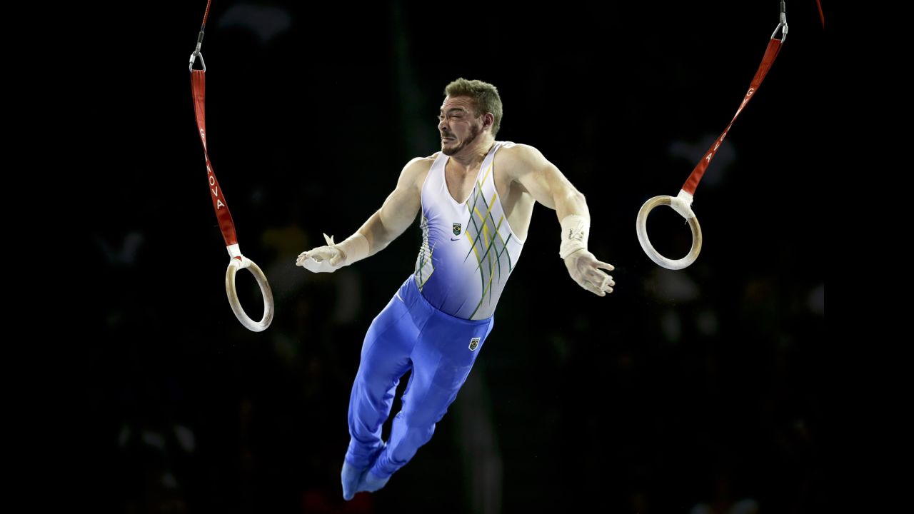 Brazil's Arthur Zanetti competes on the rings during the Pan American Games on Saturday, July 11. Brazil won silver in the team event.