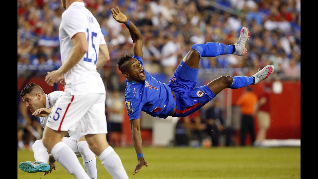 Haitian midfielder Wilde Donald Guerrier falls to the ground after attempting a bicycle kick against the United States on Friday, July 10.