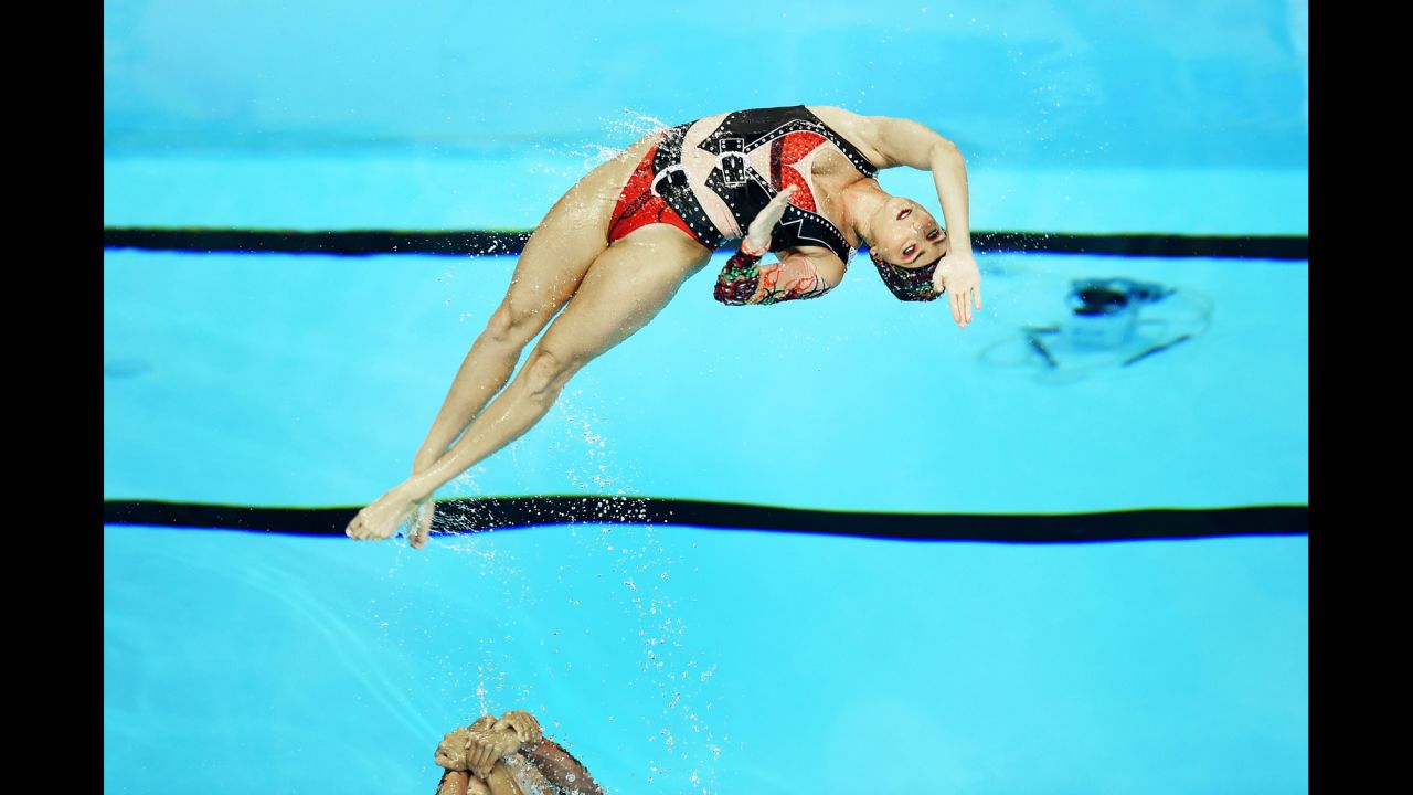 Synchronized swimmers from Brazil perform their technical routine during the Pan American Games on Thursday, July 9.
